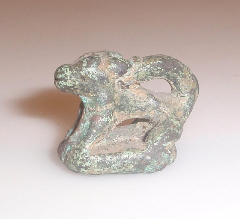 Appraisal: A small cast bronze zoomorphic stamp seal the handle modelled