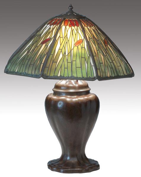 Appraisal: HANDEL Table lamp with a paneled glass shade in the