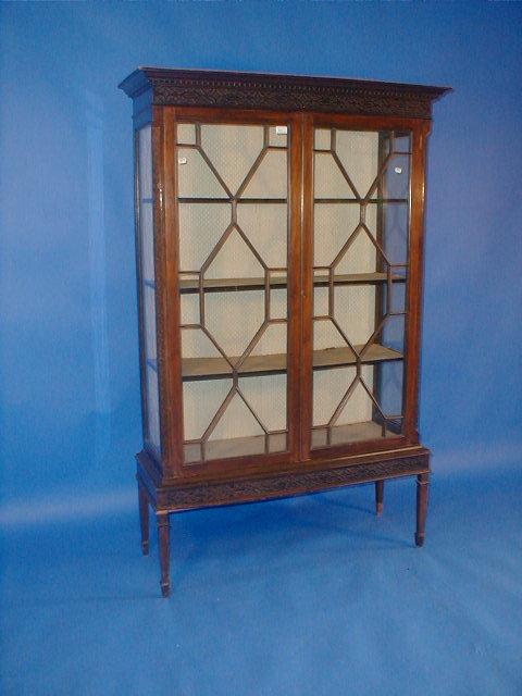 Appraisal: A late thC mahogany display cabinet with blind fret work