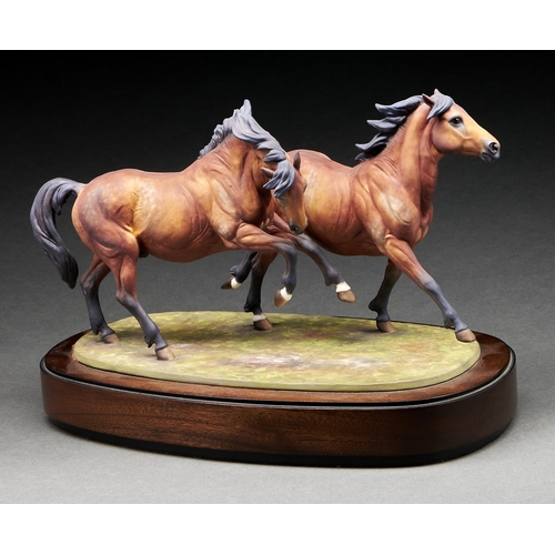 Appraisal: A Royal Worcester equestrian model of Galloping Ponies designed by