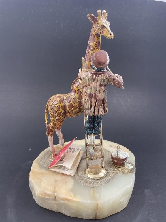 Appraisal: Metal and hardstone base clown figurine Emmett Kelly and giraffe