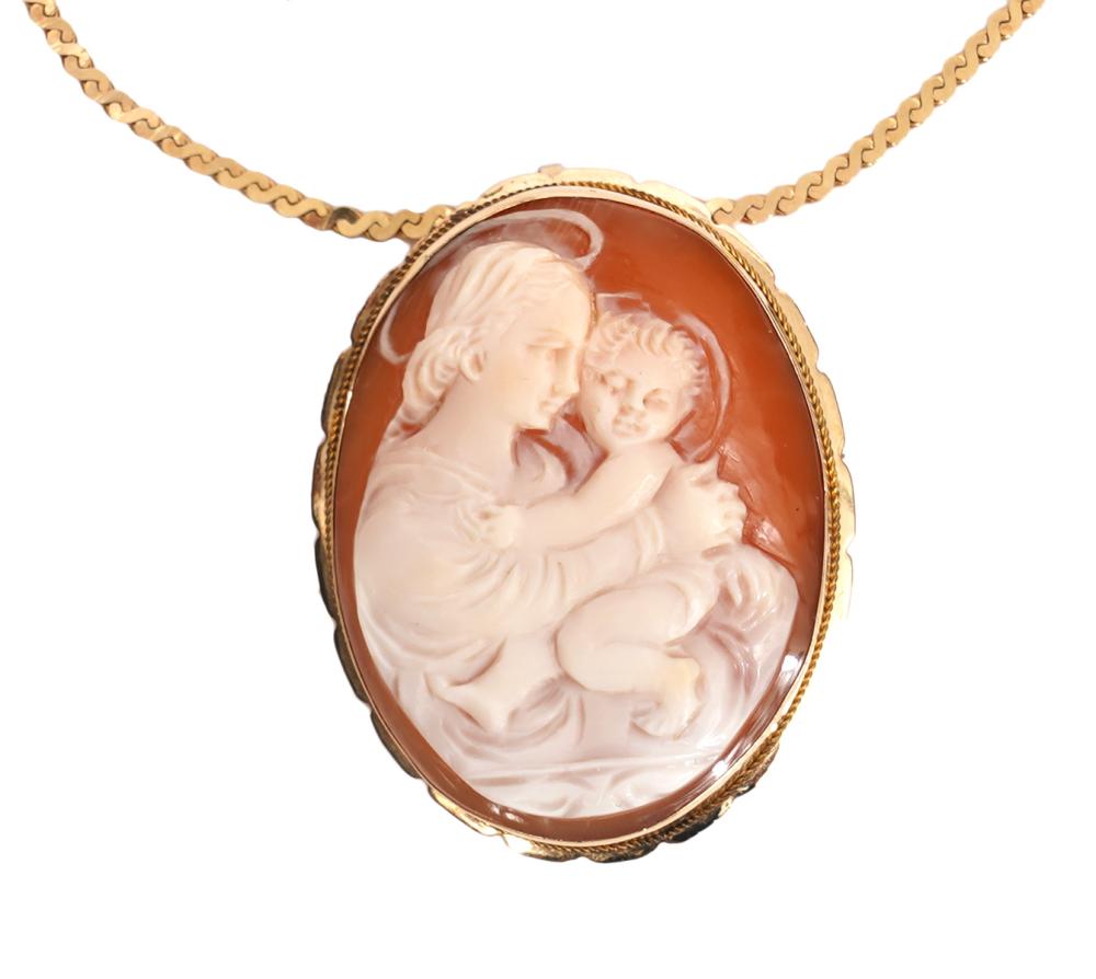 Appraisal: MADONNA CHILD CAMEO K YG PENDANT BROOCHMadonna Child beautifully carved