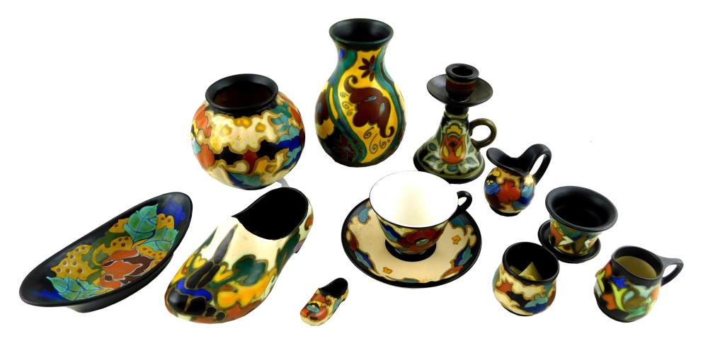 Appraisal: ART POTTERY Gouda early th C assorted patterns eleven pieces