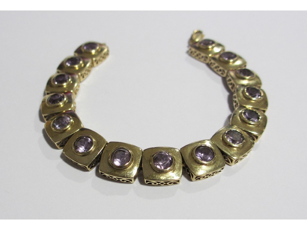 Appraisal: A ct gold amethyst set bracelet with fifteen linked square