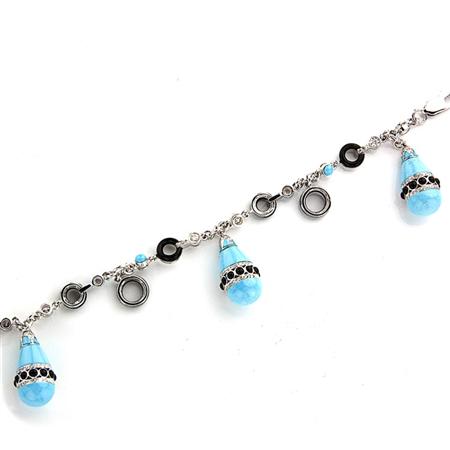 Appraisal: White Gold Turquoise Black Onyx and Diamond Charm Bracelet Estimate