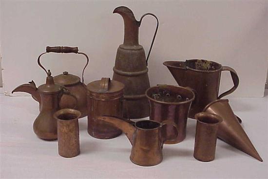 Appraisal: Copper kitchen utensils including four pitchers the largest '' h