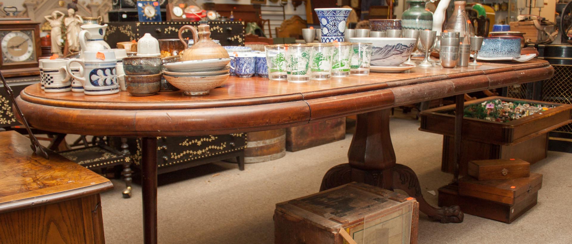 Appraisal: Mahogany oval table with leaves and glass top Undernumber