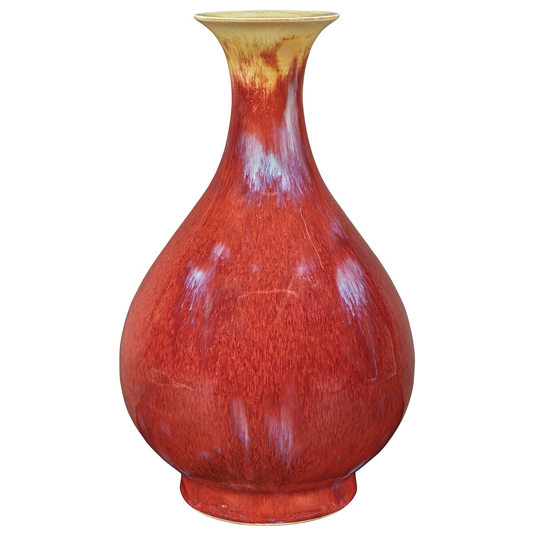 Appraisal: Chinese Flambe Glazed Porcelain Vase The robustly potted body rising