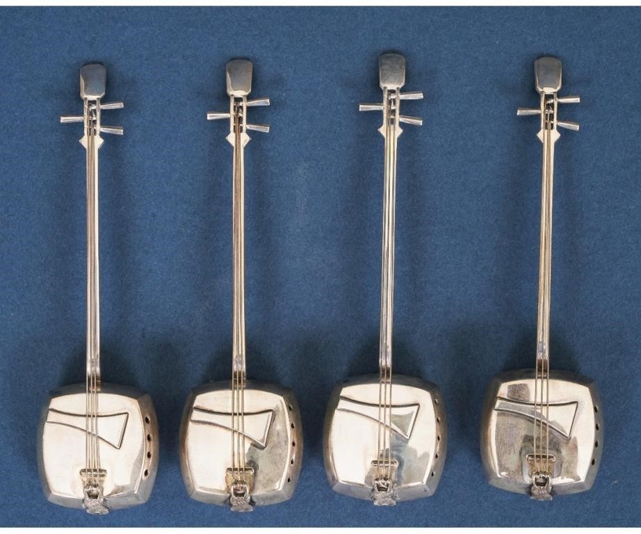 Appraisal: Set of four unusual sterling silver Japanese -string instruments form