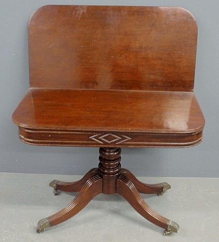 Appraisal: - English mahogany flip-top gaming table c with reeded down-swept