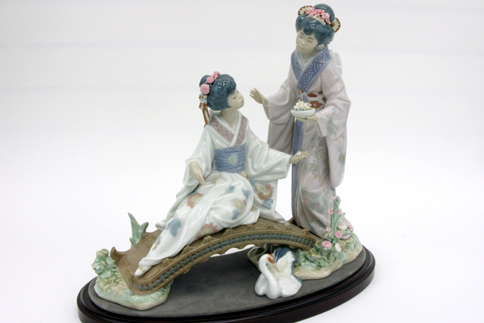 Appraisal: LLADRO PORCELAIN FIGURAL GROUP H titled New Horizons from the