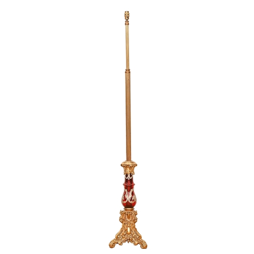 Appraisal: A gilt brass standard lamp incorporating a Bohemian ruby flashed