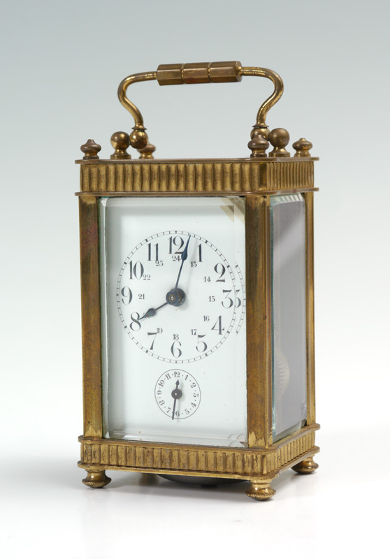 Appraisal: FRENCH BRASS CARRIAGE CLOCK Brass case beveled glass sides and