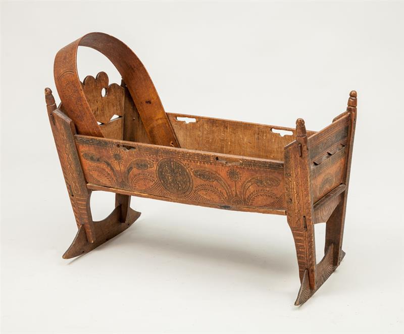 Appraisal: Continental Carved and Stained Rocking Cradle With traces of old