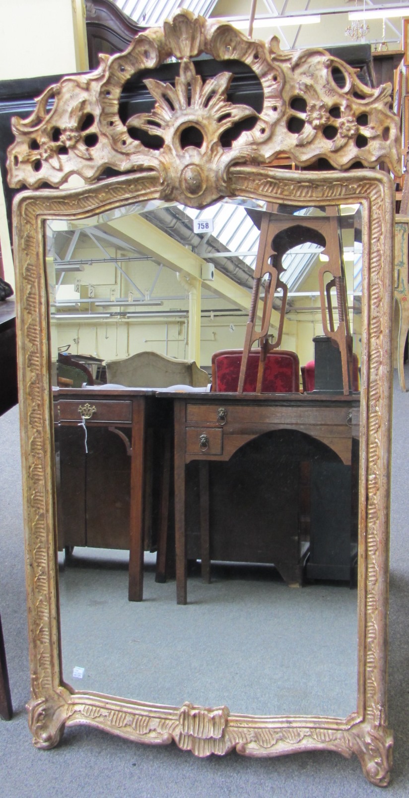 Appraisal: A late th century French gilt framed wall mirror with