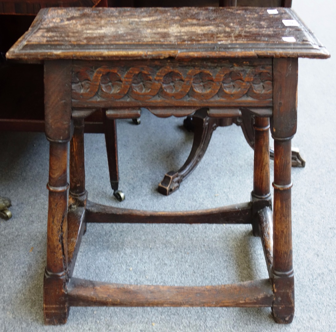 Appraisal: A th century oak joint stool with carved frieze on