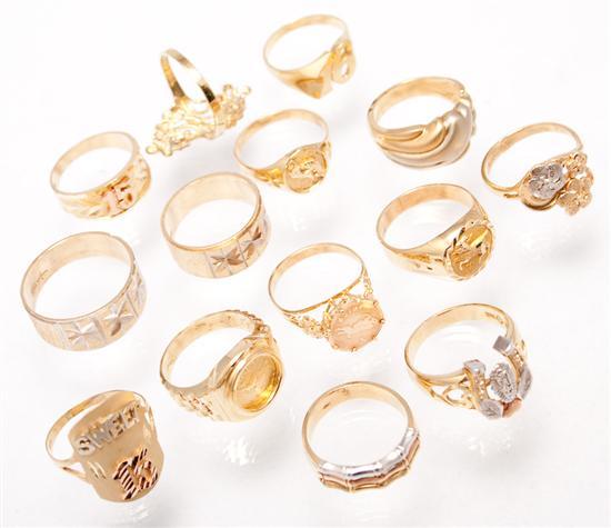 Appraisal: Thirteen K yellow gold rings together with one K gold