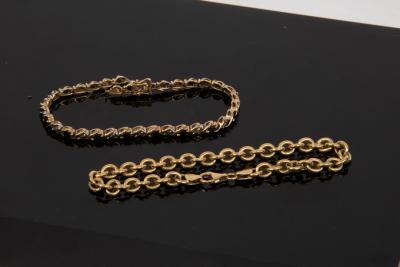 Appraisal: An ct yellow gold bracelet approximately gm and a sapphire