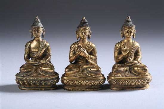 Appraisal: THREE TIBETAN GILT BRONZE FIGURES OF BUDDHA Each seated in