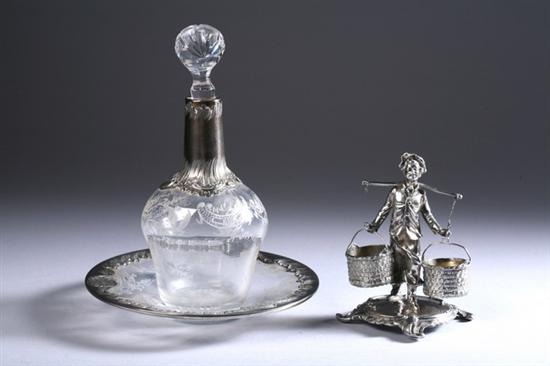 Appraisal: FRENCH SILVER-MOUNTED GLASS DECANTER WITH UNDERPLATE AND CONTINENTAL FIGURAL SALT