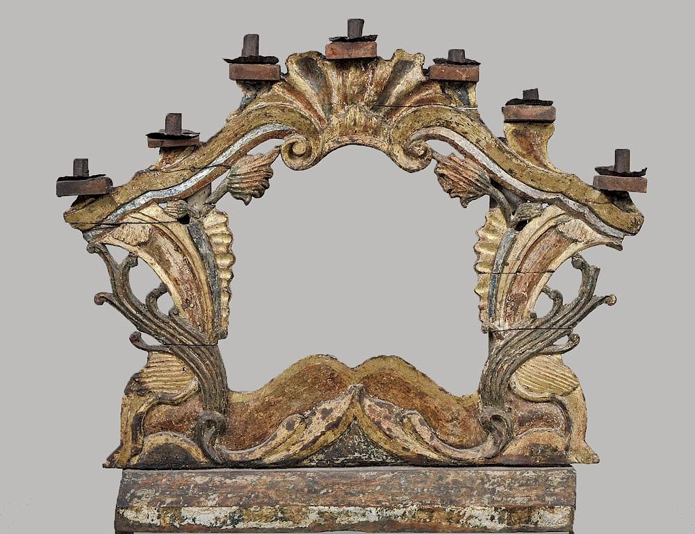 Appraisal: COLONIAL CARVED AND PAINTED WOOD SEVEN LIGHT CANDELABRUM Spanish The