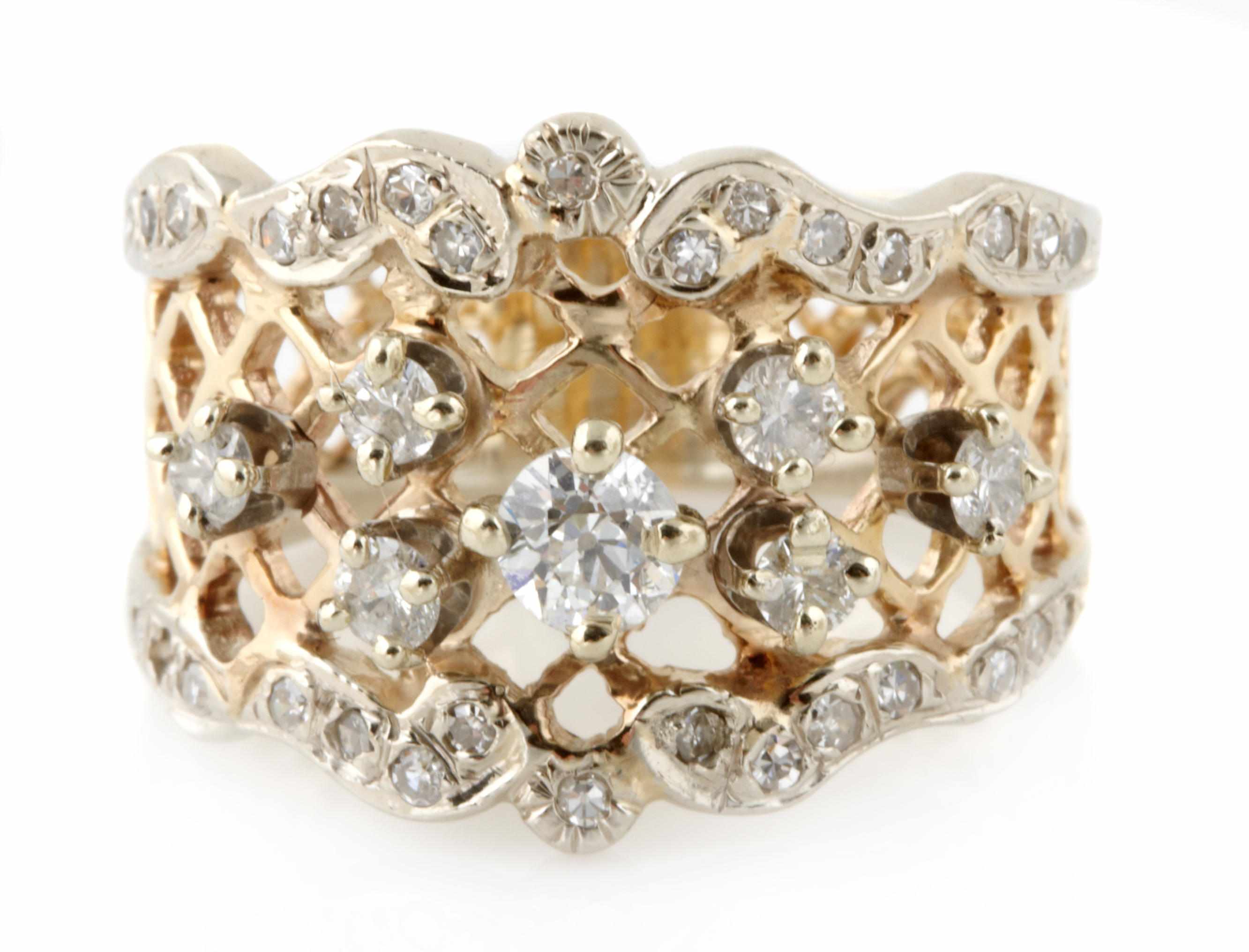 Appraisal: A diamond and k bicolor gold lattice design ring size