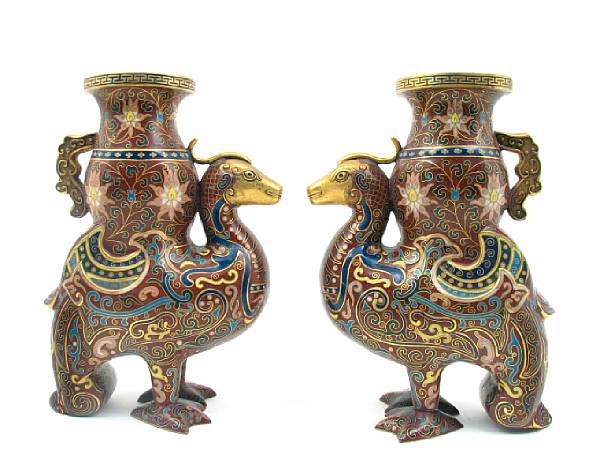 Appraisal: A pair of Chinese cloissone enameled metal phoenix bird vases