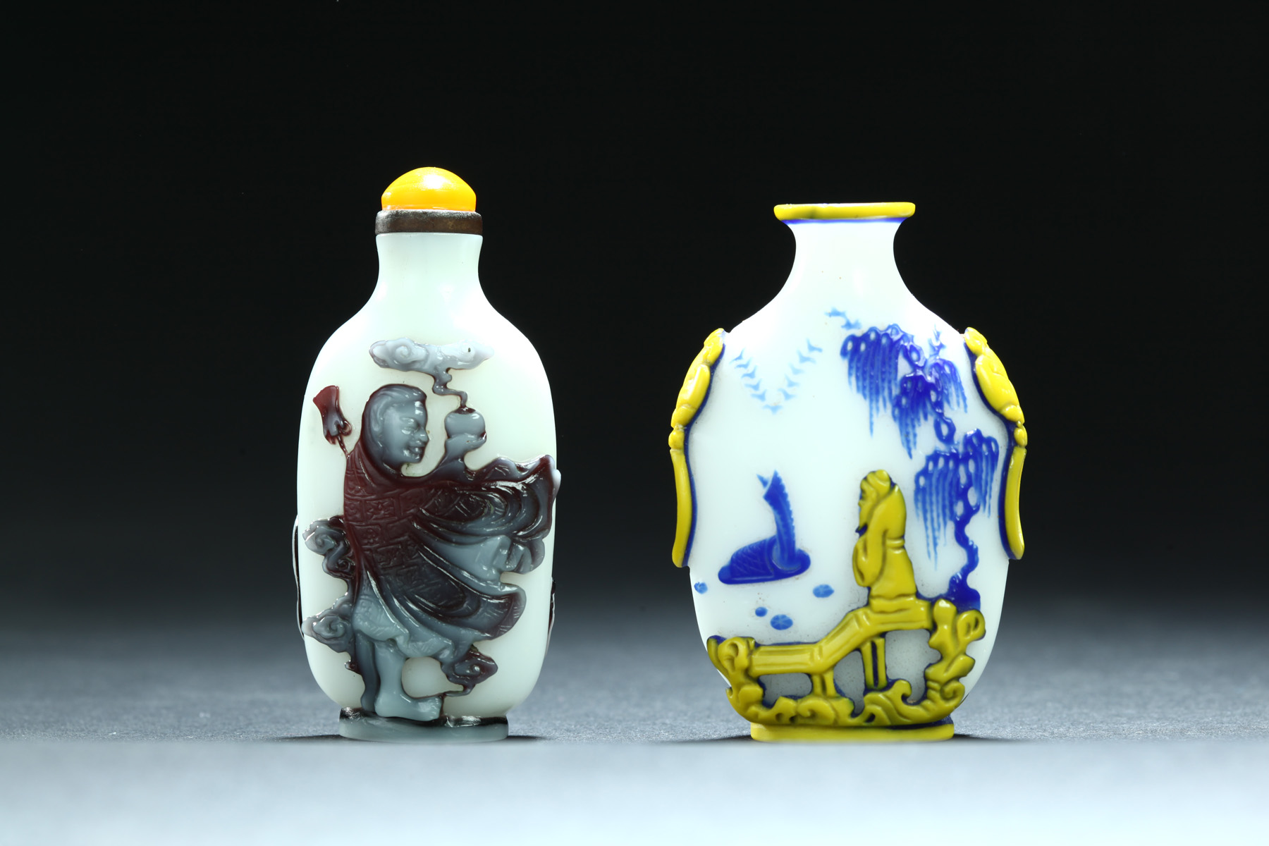 Appraisal: TWO PEKING GLASS SNUFF BOTTLES China th century Both are