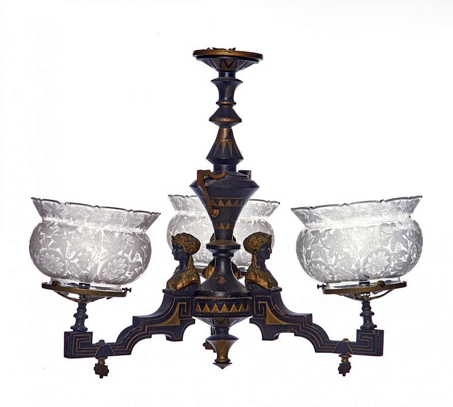 Appraisal: Egyptian revival light chandelier Egyptian revival light gasolier iron chandelier