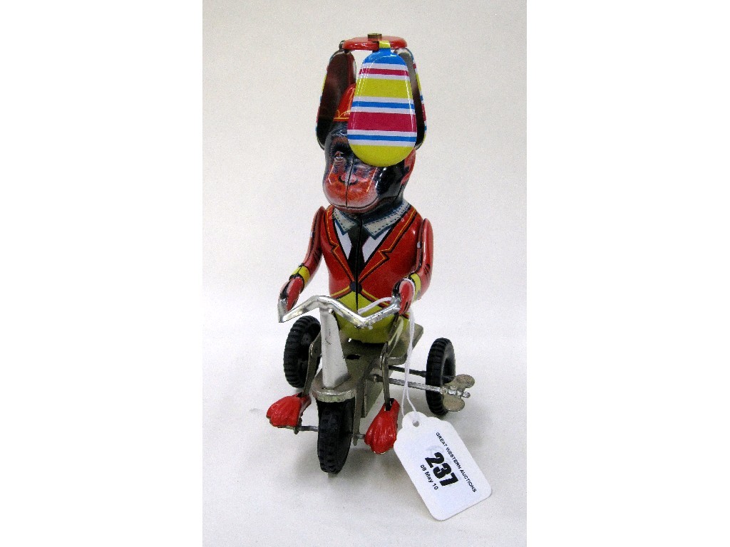 Appraisal: Tinplate clockwork toy 'Monkey on a tricycle'