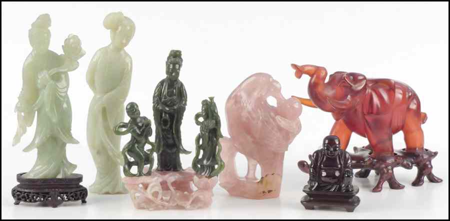 Appraisal: CARVED SPINACH JADE AND QUARTZ FIGURAL GROUP Together with a