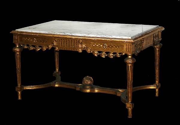 Appraisal: A Louis XVI style giltwood and marble top center table