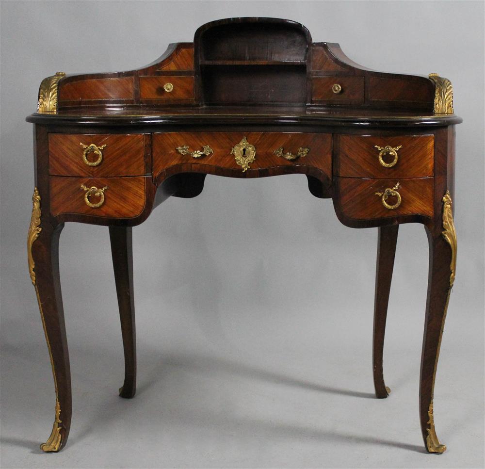 Appraisal: LOUIS XV STYLE KIDNEY SHAPED TULIPWOOD WRITING DESK with mixed