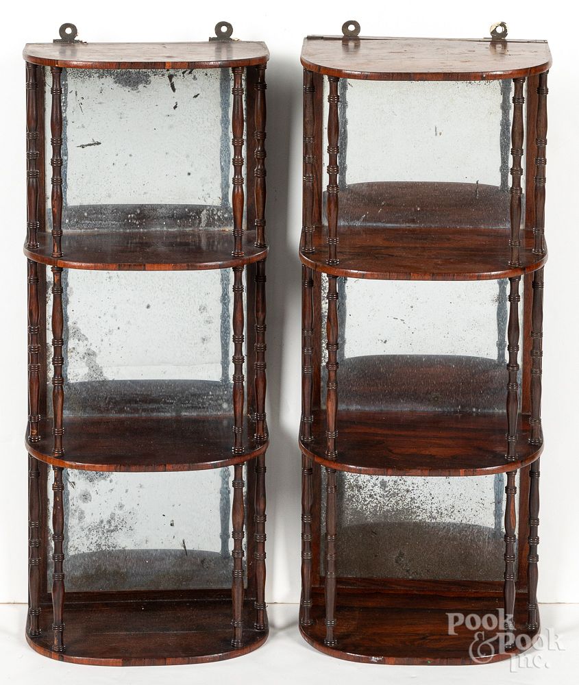 Appraisal: Pair of English mirrored wall shelves Pair of English rosewood