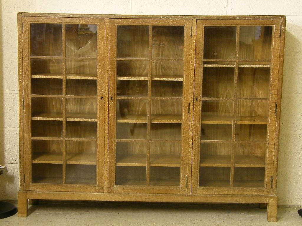 Appraisal: Heal Sons of London limed oak glazed bookcase with three