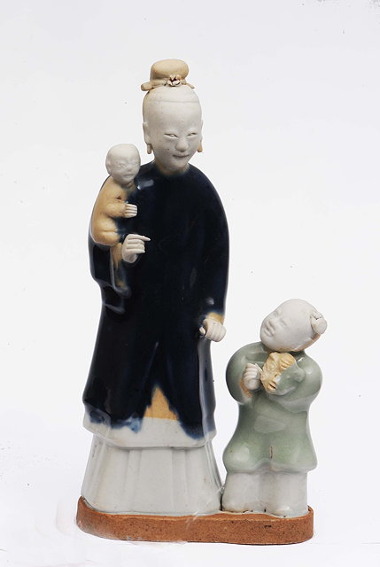 Appraisal: A Chinese blue celadon and white glaze biscuit figure group