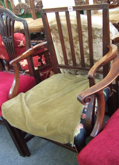 Appraisal: An early th century mahogany stick back open armchair with