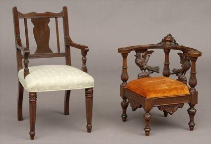 Appraisal: RENAISSANCE-STYLE CARVED WALNUT CHILD'S CORNER CHAIR AND AN ARMCHAIR The