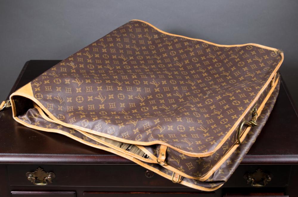 Appraisal: VINTAGE LOUIS VUITTON GARMENT BAG monogram canvas with leather handle