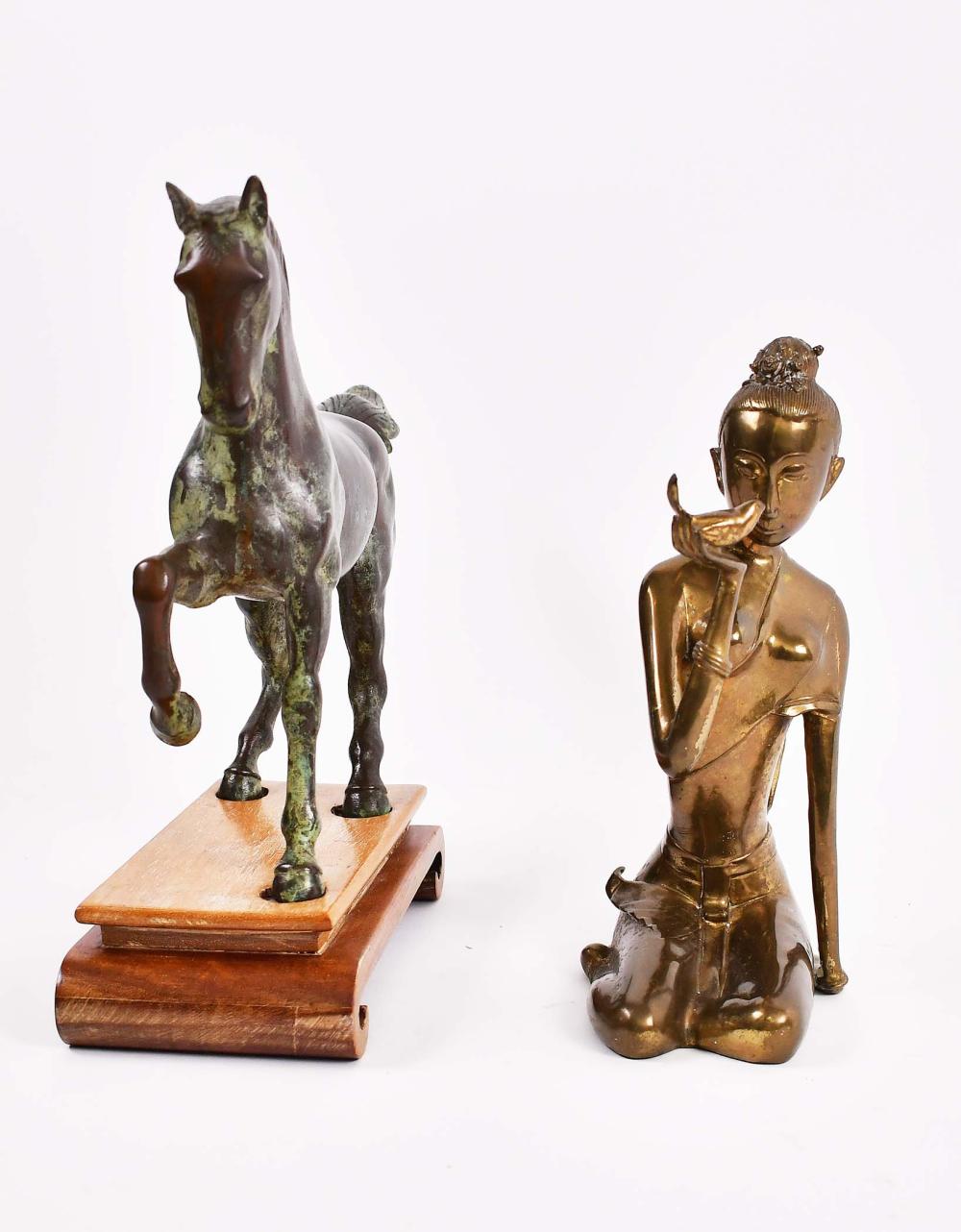 Appraisal: BRONZE MAIDEN AND A BRONZE HORSEThe first probably Contemporary East