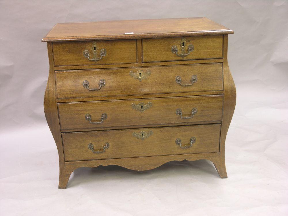 Appraisal: A th century Dutch mahogany bombe chest two short and