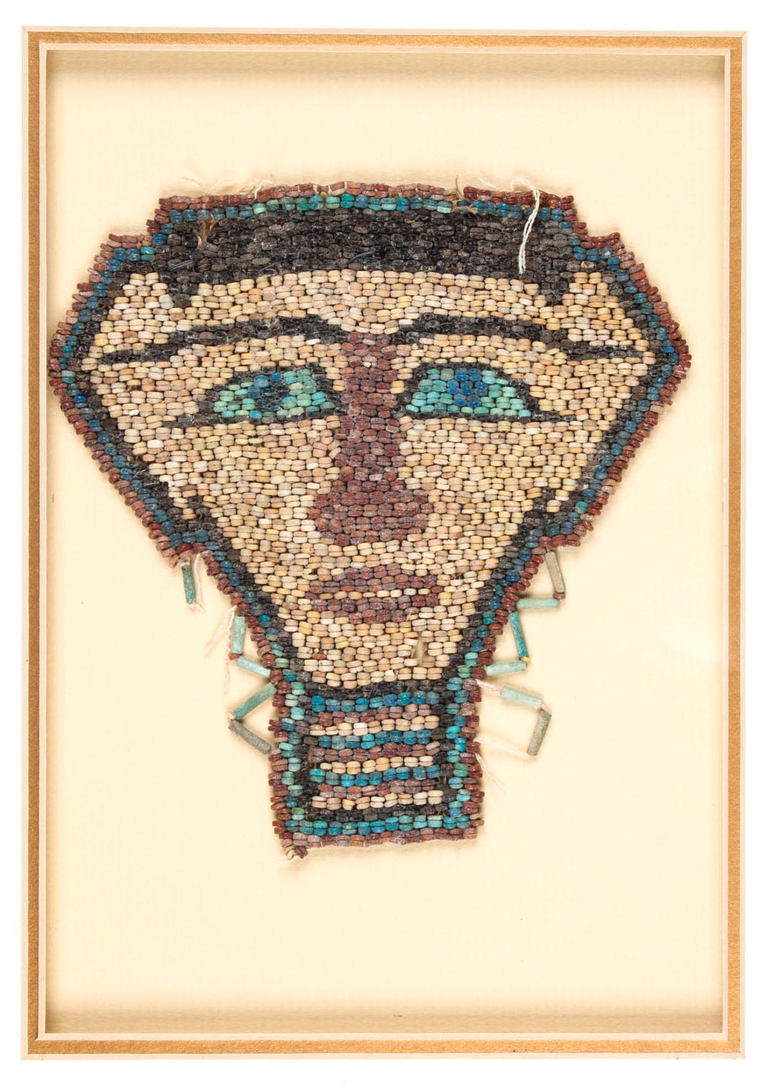 Appraisal: Egyptian stone and faience bead mask representing the goddess Hathor