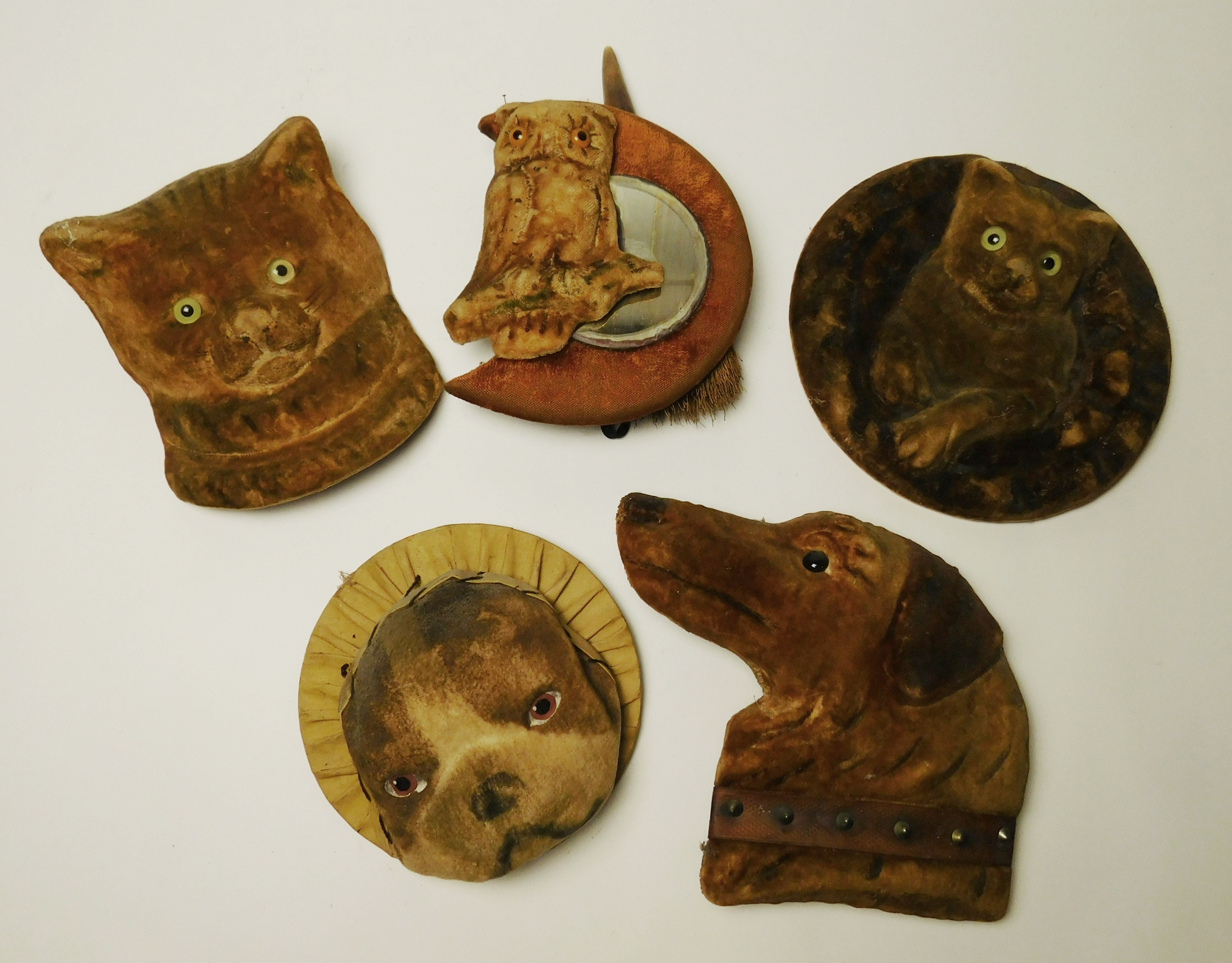 Appraisal: Papier mache and velvet masks- dogs cats and owl owl