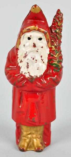 Appraisal: Cast Iron Hubley Santa With Tree Still Bank Description Circa