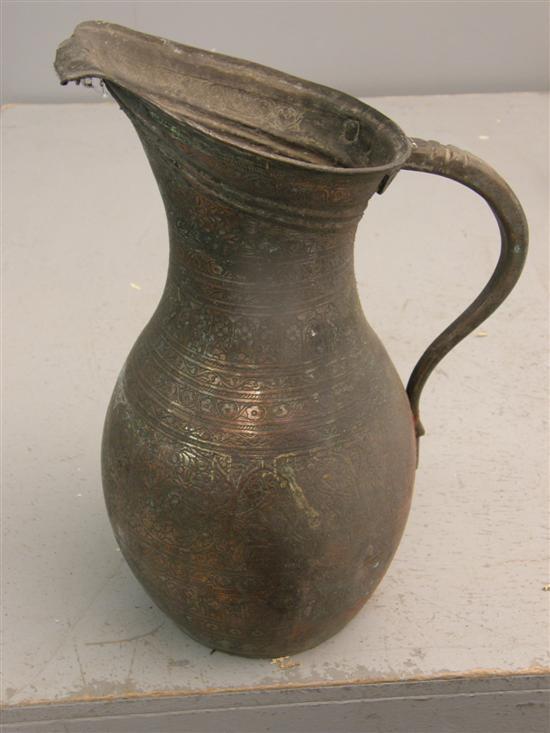 Appraisal: Islamic copper jug with multiple bands of horizontal floral decoration