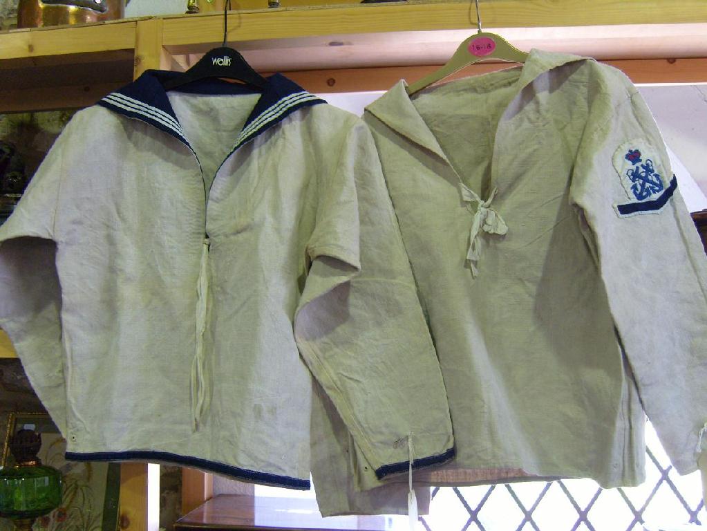 Appraisal: Two early th century sailors cream canvas shirts with blue