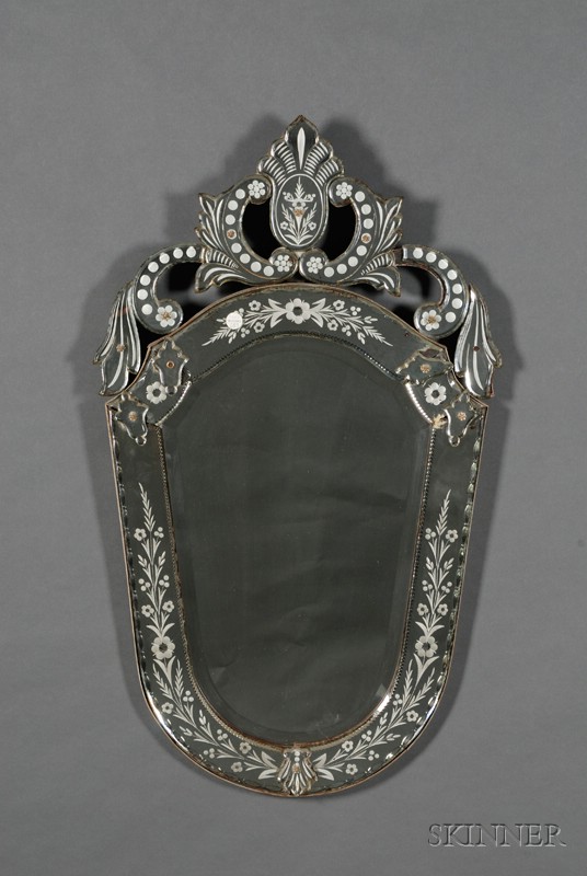 Appraisal: Venetian Glass Mirror-framed Mirror early th century shield shaped with