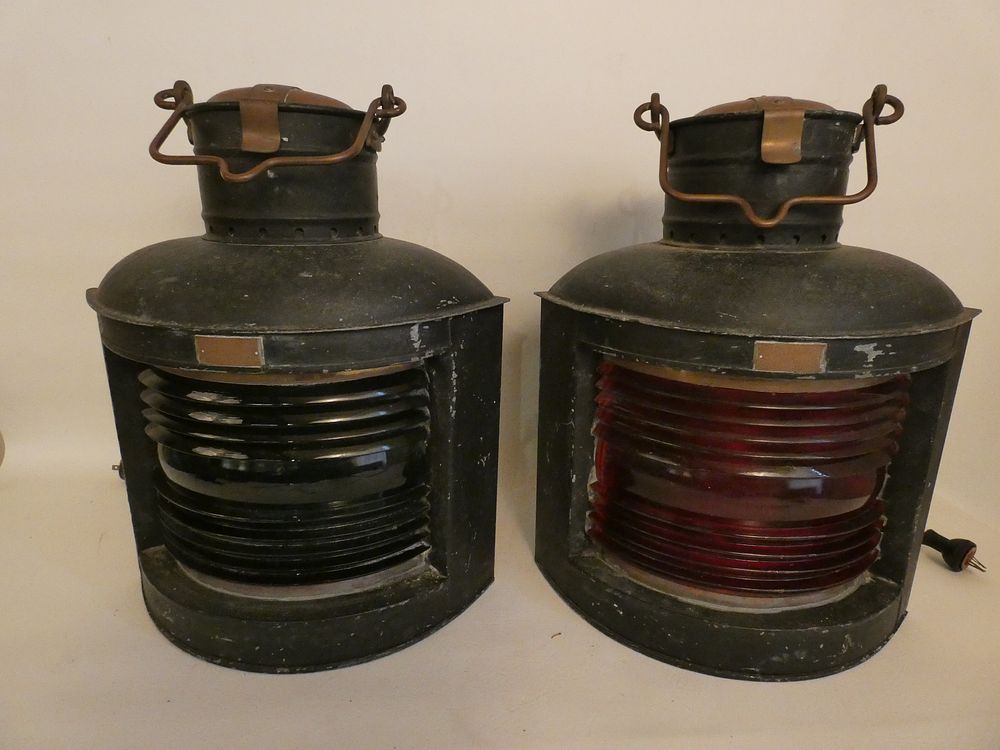 Appraisal: PAIR PERKO SHIP LANTERNS Pair old metal ship lanterns signed