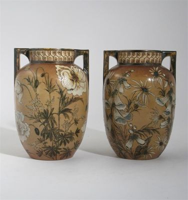 Appraisal: A pair of Martin Brothers stoneware vases twin-handled form incised