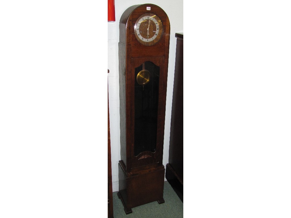 Appraisal: Oak grand daughter clock